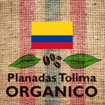 Planadas Tolima Organico coffee logo with Colombian flag on burlap background